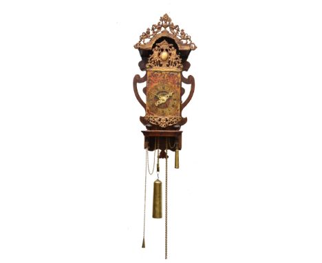 A mid 18th Century Dutch Friesland Stoelklok of traditional form, the painted Roman dial decorated with a pair of angels and 