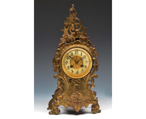 A late 19th Century French brass mantel clock with Gothic enamel dial, the twin train Japy movement with outside count wheel 