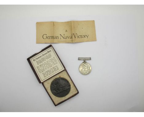 Lusitania Commemorative Medal, in original box, with leaflet;  WWII War Medal, no ribbon.