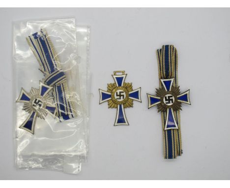 WWII German Third Reich Mother's Crosses, in bronze, silver and gold.