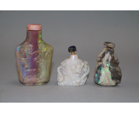 Three Chinese carved opal snuff bottles