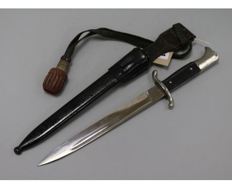 A WWII German III Reich K 98 dress bayonet, the blade stamped with maker's name, Horst Wolff, Leipzig, in black leather scabb