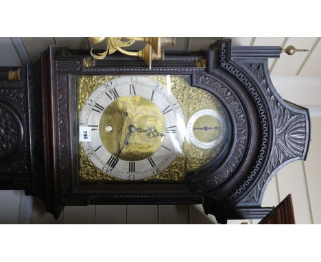 A George III oak eight-day longcase clock, Francis Eck (Northampton 1777), the case later carved