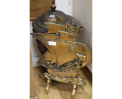 A brass firescreen and a copper coal bucket