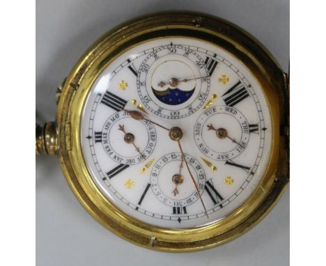 An engine turned gilt metal triple calendar and moonphase pocket watch.