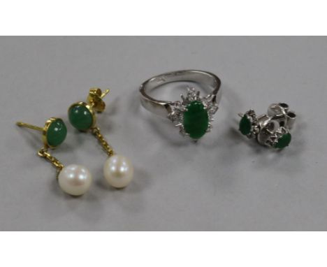 A pair of 14ct yellow gold, jade and pearl earrings, a pair of white gold and jade earrings and a jade ring
