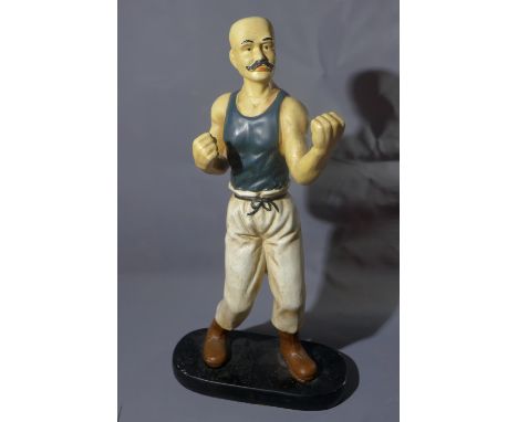 A mid 20th century Russian ceramic figure of a boxer, H.39cm 