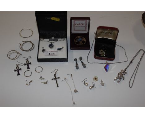 A boxed Swarovski necklace and ear-rings; a Sterling silver mounted set; a boxed Celtic hardstone brooch; and a small quantit
