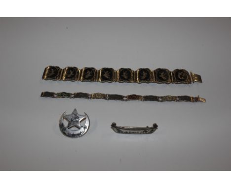 A Niello ware work bracelet; a Sterling silver and enamel bracelet, and two Niello ware brooches 