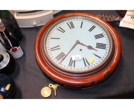 A circular cased school clock  AF