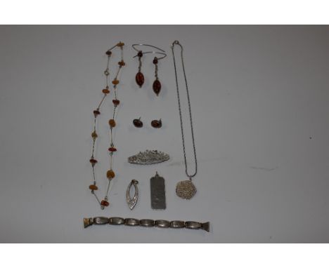 A quantity of various jewellery to include Sterling silver and amber examples; vintage watch strap etc., approx. total weight