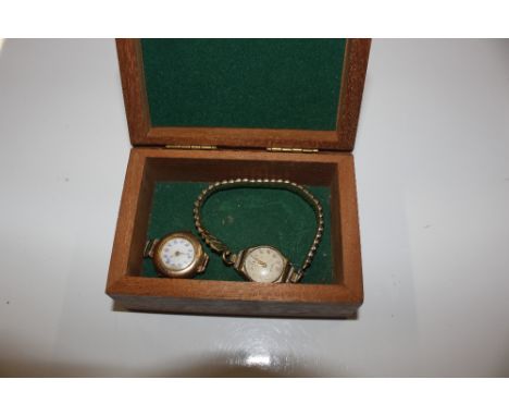 A 14ct gold cased watch with enamel dial; and a 9ct gold cased Rotary ladies wrist watch 