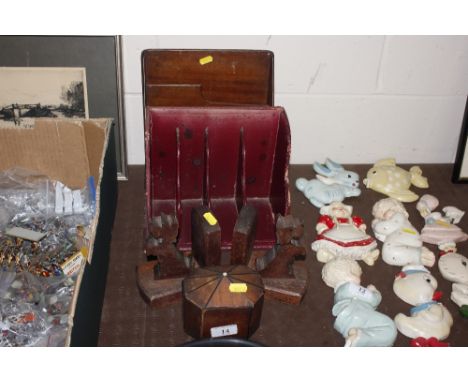 An antique wooden tea caddy; a pair of Art Deco bookends  in the form of Scottie dogs; and two stationery racks