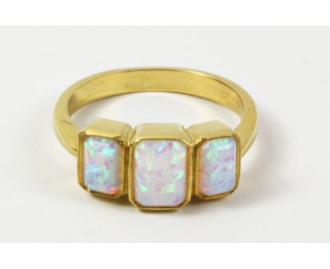 Three stone opal silver-gilt ring stamped 925   Condition Report   Click here for further images, condition, auction times & 