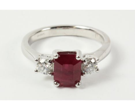 Ruby and diamond three stone white gold ring hallmarked   Condition Report   Click here for further images, condition, auctio