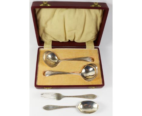 Pair of hallmarked silver sauce ladles cased and a christening spoon and fork approx 4oz   Condition Report   Click here for 