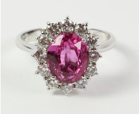 Pink sapphire and diamond white gold cluster ring hallmarked 18ct (sapphire approx 2.9 carat)   Condition Report   Click here