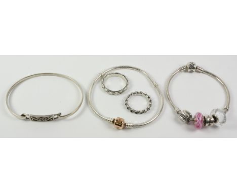Two Pandora charm braclets and two rings all stamped S925 ALE and Mackintosh style bangle stamped 925   Condition Report   Cl