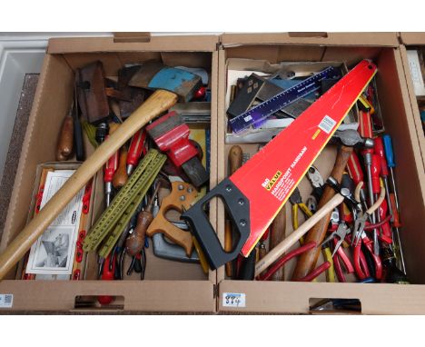 Quantity of various tools including - screwdrivers, saws, plyers, hammers etc... in four boxes   Condition Report   Click her