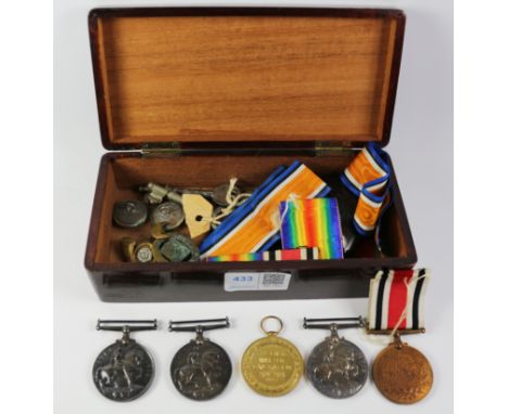 Group of three WWI medals awarded to 176645 GNR. B. B. Heaton  R. A. other medals and badges etc in wooden box   Condition Re
