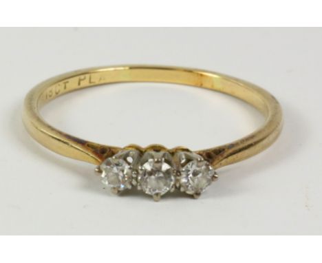 Three stone diamond ring stamped 18ctplat   Condition Report   Click here for further images, condition, auction times & deli