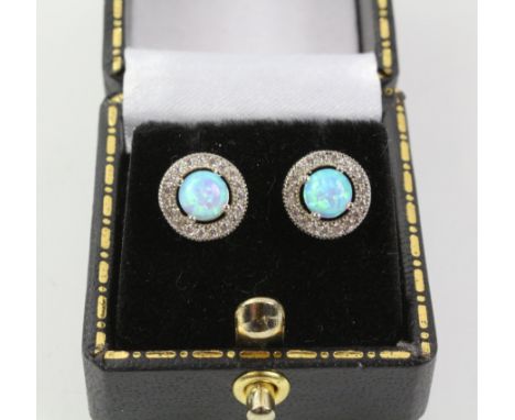 Pair of opal halo dress ear-rings stamped 925   Condition Report   Click here for further images, condition, auction times & 