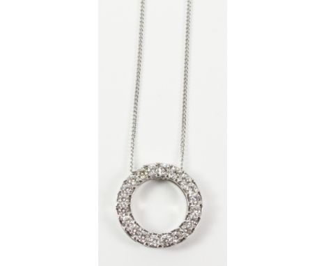 White gold brilliant cut diamond circle pendant necklace stamped 750   Condition Report   Click here for further images, cond