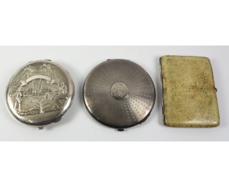Dunhill shagreen and silver-gilt cigarette case London 1928, a hallmarked silver compact and a colonial compact stamped sterl