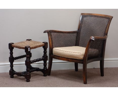 Early 20th century beech framed cane armchair and a bobbin turned and rush seat stool   Condition Report   Click here for fur