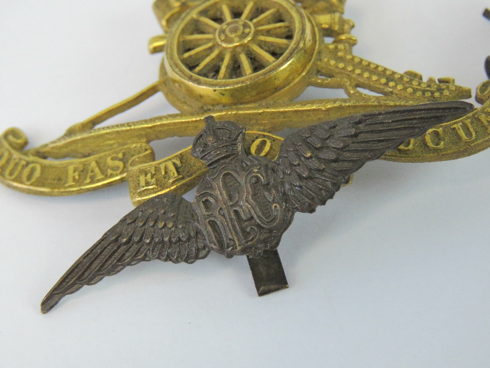 Two Royal flying Corps badges, Royal Artillery brass badge and a pair ...