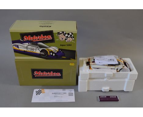 A boxed Motorbox Exoto Jaguar XJR-9LM (1988) Le Mans 24hour Martin Brundle/ John Nielsen,in 1:18 scale, appears VG/E in VG/E 