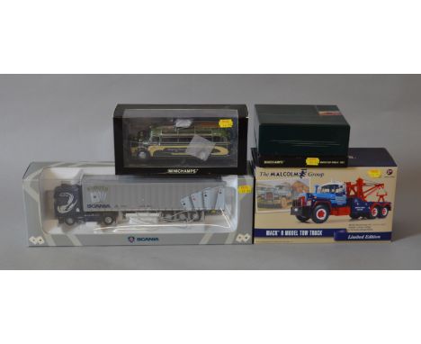 Mixed lot of boxed diecast models in various scales including a 1:34 scale First Gear Mack R Model Tow Truck - limited editio