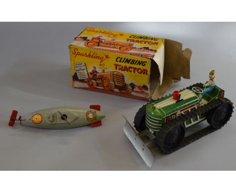 An unboxed 1953 Sutcliffe Submarine (Unda-Wunda), approx 23cm long,  bearing a good ' Cornonation 1953' decal on the top of t