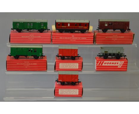 OO Gauge. Hornby Dublo. 7 x boxed rolling stock. 4323 SR 4-wheeled utility van, 4644 21 ton hopper wagon, 4315 BR maroon hors