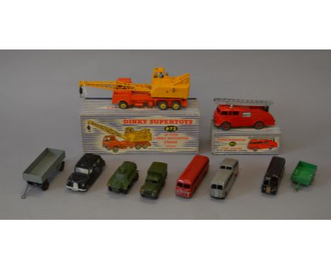 Two  boxed Dinky Toys, 955 Fire Engine and 972 Coles Crane together with eight unboxed Dinky Toys. The models are mostly F wi