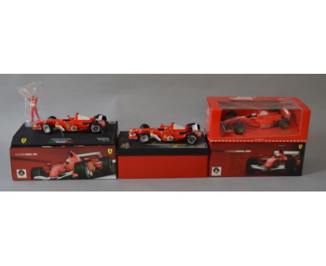 Two boxed  Hot Wheels Racing 1:18 scale MIchael Schumacher  Ferrari Formula 1 Racing Cars '10.9.2006 Monza, Italy' and '1.10.