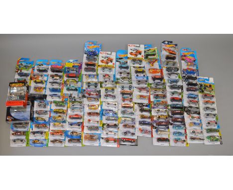 140+ Hot Wheels carded diecast models together with a boxed  Johnny Lightning twin model pack -  1956 Chevy Nomad including l