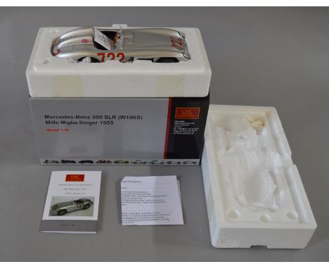 A boxed CMC Mercedes Benz 300 SLR (W196S) Mille Miglia 1955,in 1:18 scale, appears VG/E in VG/E box. (1)