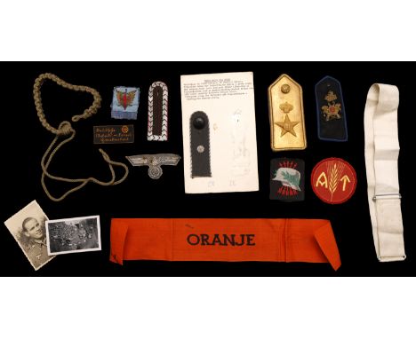German and Overseas Second World War Insignia. A mixed group of insignia, comprising a lanyard in light green, which is presu