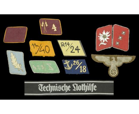 German Second World War Political and S.A. Insignia. An interesting group of insignia comprising a Teno Bevo woven armband, f