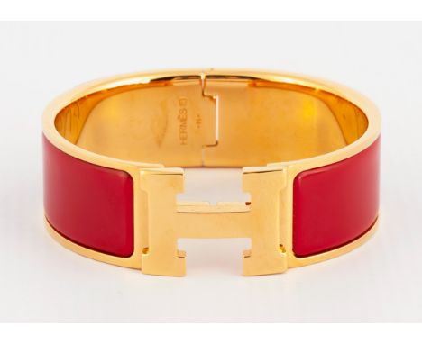 The 20mm bangle with red enamel inlay , gold plated bangle with original box and original velvet pouch