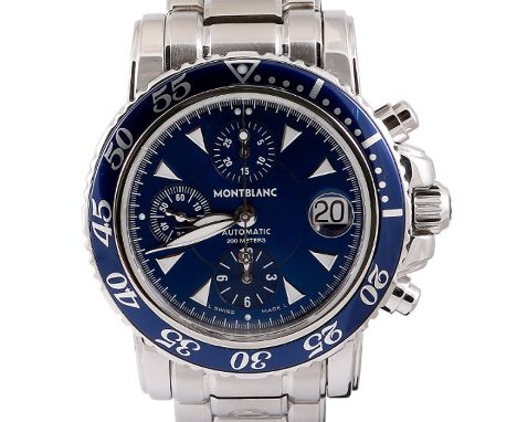 Reference number 7034, the 42mm round blue dial with arrowhead hour markers, calibrated outer ring and three inner subsidiary