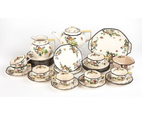 Comprising: 7 cups, 11 sauces, 12 cake plates, a tea pot, milk jug, sugar basin and cake plateCake plate 25,5cm diameter(34)