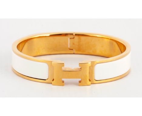 12mm wide , white inner enamel , gold plated accompanied by an original box and velvet pouch