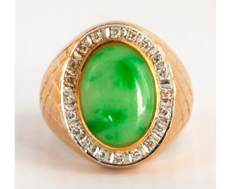 The 15mm oval Jade, bezel set to the centre, pave set to the surround with approximately 0,60 carats of round brilliant cut d