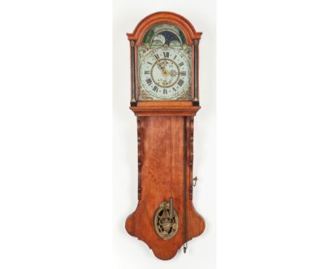 The domed cresting fitted with figures of Atlas and the angels, the painted dial with Arabic and Roman numerals and moon phas