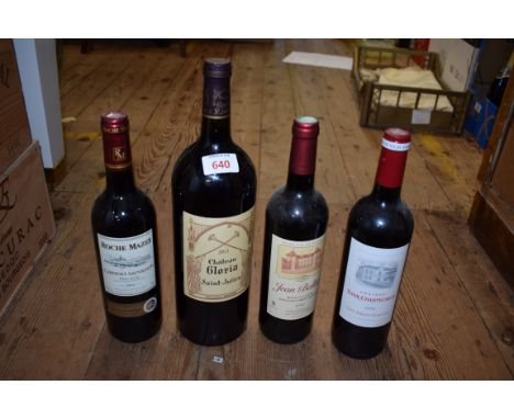 Eight bottles of mixed red wine, comprising: a 150cl magnum of 2011 Chateau Gloria Saint-Julien; a 75cl 2008 Chateau Tour Cha