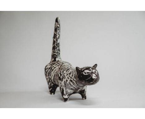 David Hockney (b1937) The Black and White Cat. A ceramic sculpture of a black and white cat with elongated upright tail. Circ