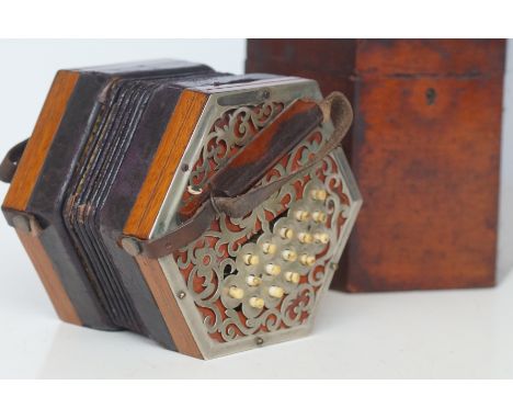 33 Button cased concertina, in need of some restoration 