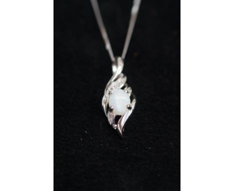 9ct White gold pendant with central opal &amp; chip diamonds 